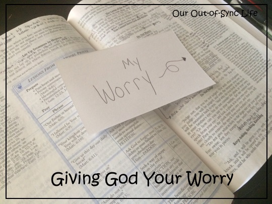 Bible open with note card saying "My Worry."