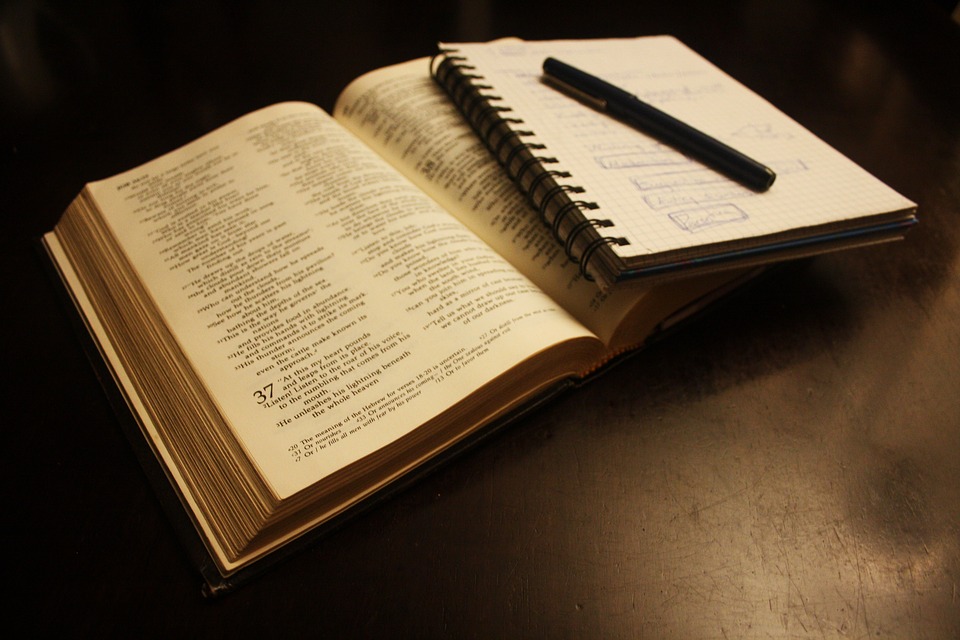 A Bible, notebook, and pen ready for a Quiet Time.