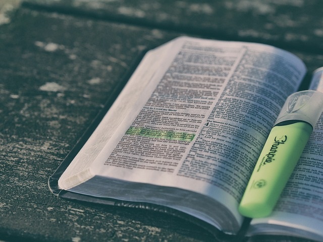 Bible open with highlighter.