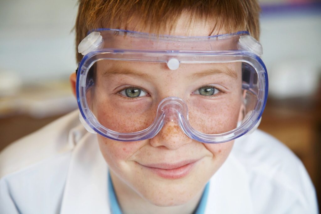 Child with science glasses on.