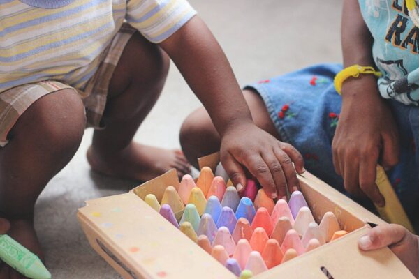 child with sidewalk chalk