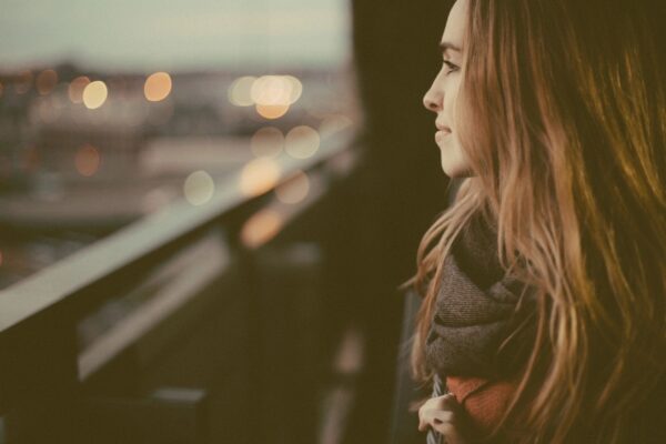 women looking out window