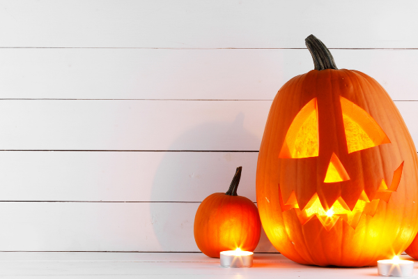 Candles around a jack-o-lantern