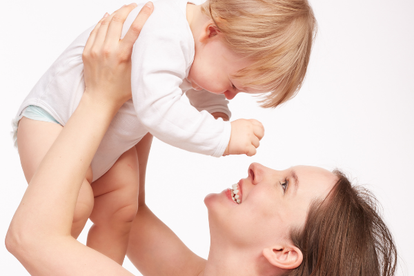 Mom and Child playing while having meaningful conversation.