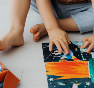 Child playing in bedroom during quiet time.
