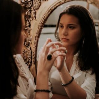 Women looking in the mirror