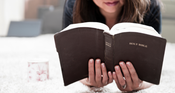 Woman reading the Bible.