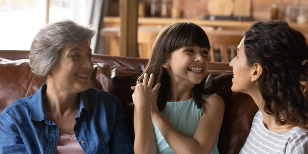 Child talking to adults.