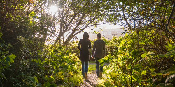 Two women walking.