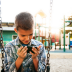 Child at park on electronic