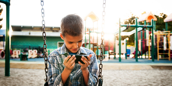 Child at park on electronic