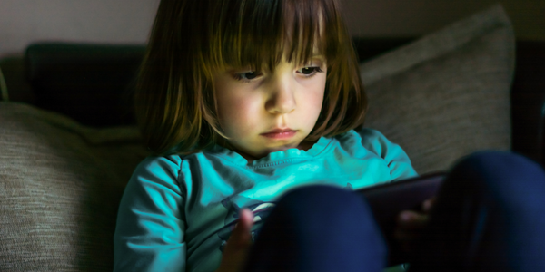 Child on an electronic device.