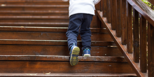 Child climbing stairs.