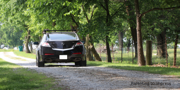 Car leaving the driveway.