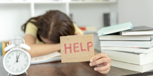 Mom holding a "help" sign.