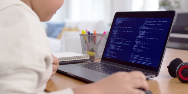 A child on a computer using AI technology.