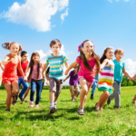 Children running outside to play.