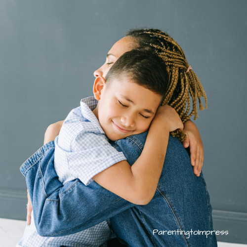 Mom and son hugging.