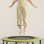 child jumping on mini trampoline