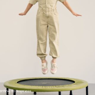 child jumping on mini trampoline