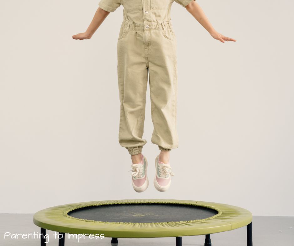 child jumping on mini-trampoline, which is often used in OT