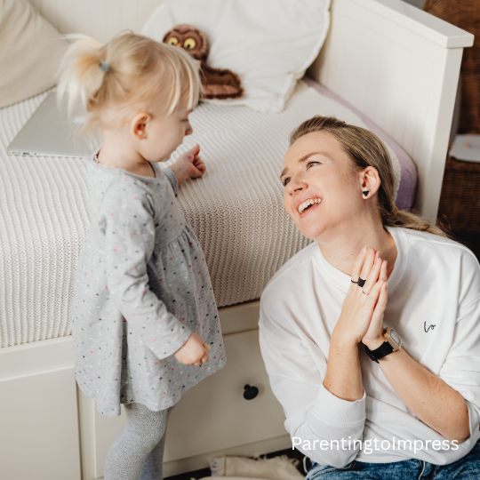 A mom talking to her toddler.