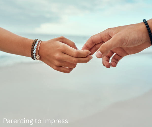 A parent letting go of child's hand