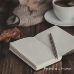 Journal with pen, coffee