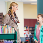 little girl asking librarian for help