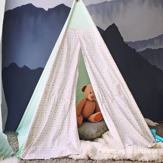 A tent with a teddy bear in it.